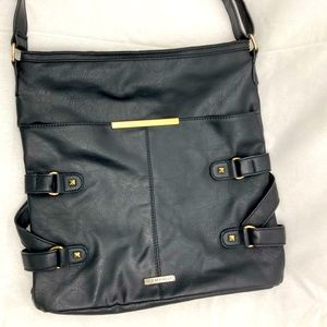 Rampage black cross-body bag with gold detailing and adjustable strap.
